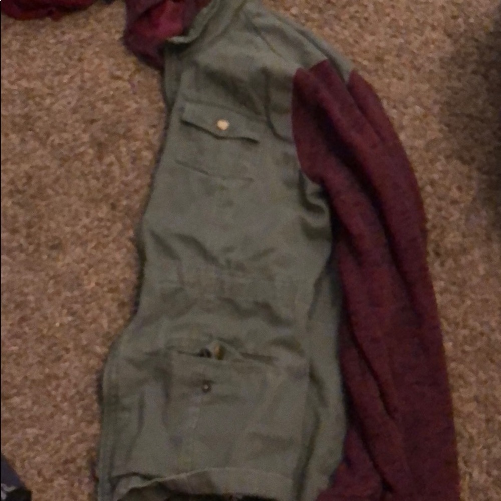Army jacket with maroon sleeves
